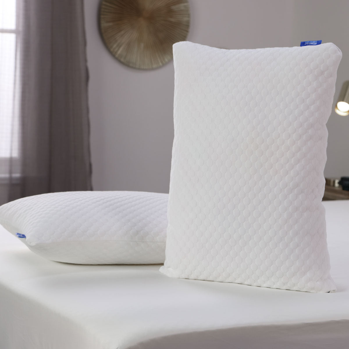 A pair of Seriously Comfortable Cool Cloud Comfort pillows 